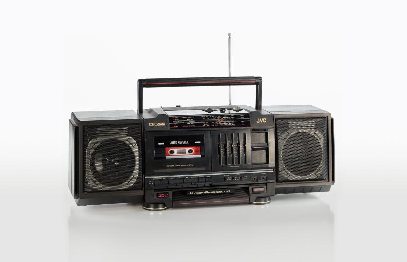 A JVC branded 'boom box' portable tape player and radio with a large carry handle.