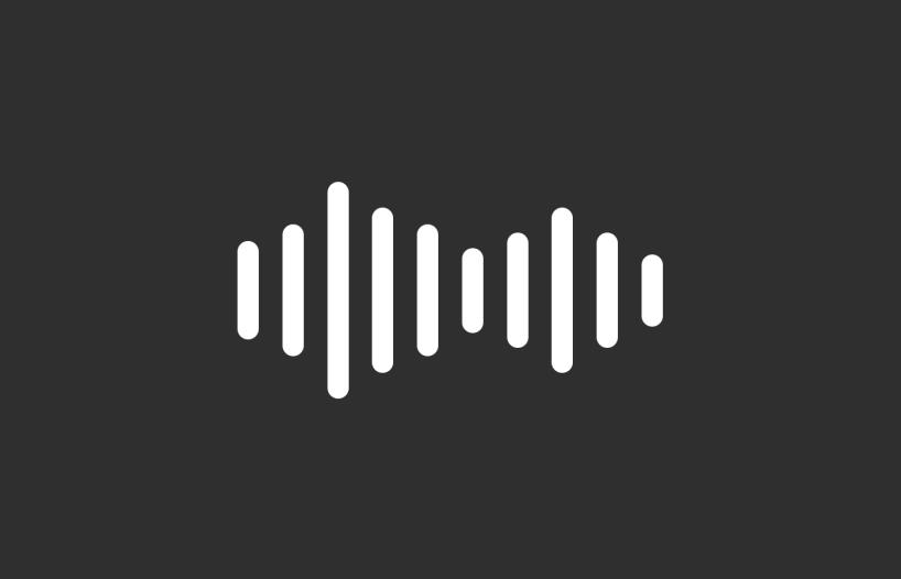 An audio wave form made up of vertical lines, against a dark background
