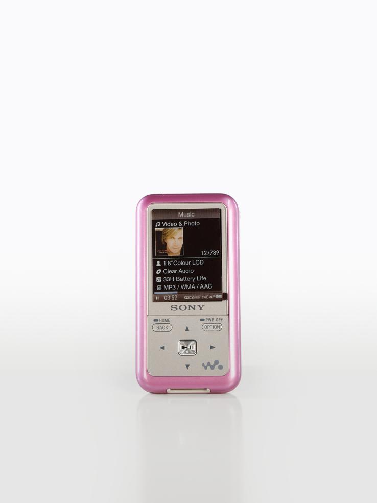 A pink Sony branded digital mp3 music player. 