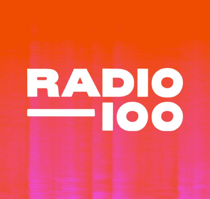 A square logo with a bright orange and pink graphic treatment that reads RADIO 100.