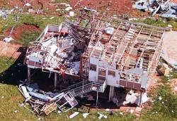 Overhead photo of a destroyed house.