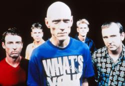 The five members of Midnight Oil with Peter Garrett at the front.
