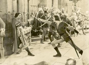 Errol Flynn sword fights Basil Rathbone