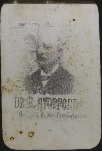 Very faded image of the profile of a man with his name, Dr R Stoppard, printed below.