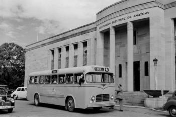 The Australian Institute of Anatomy with a bus outside