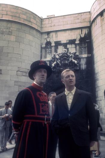Graham Kennedy stand with a Beefeater at the Tower of London
