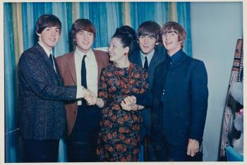 Binny lum pictured with The Beatles (Paul McCartney, John Lennon, George Harrison, Ringo Starr) in Melbourne, June 1964