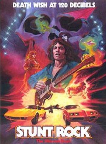 Lurid film poster shows a man with a guitar surrounded by cars, a skulls and the text 'death wish at 120 decibels. Stunt Rock'