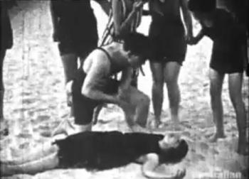 Still frame of a Lifesavers advertisement showing a woman rescued by a lifesaver.
