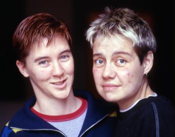 Head and shoulders shot of two women looking directly at camera.