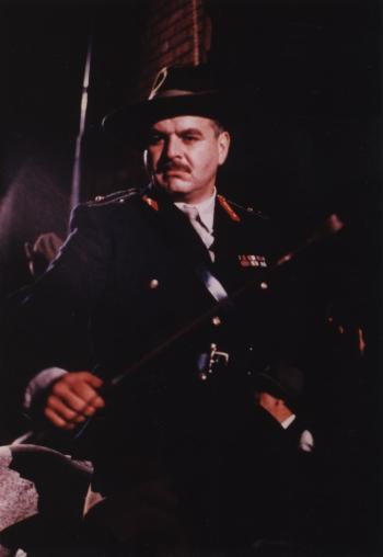 Hugh Keays-Byrne wearing a military uniform