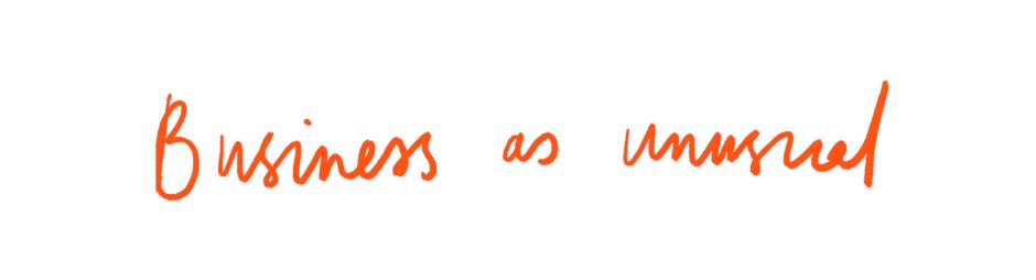 The words 'Business as unusual' written in a script font in orange against a white background