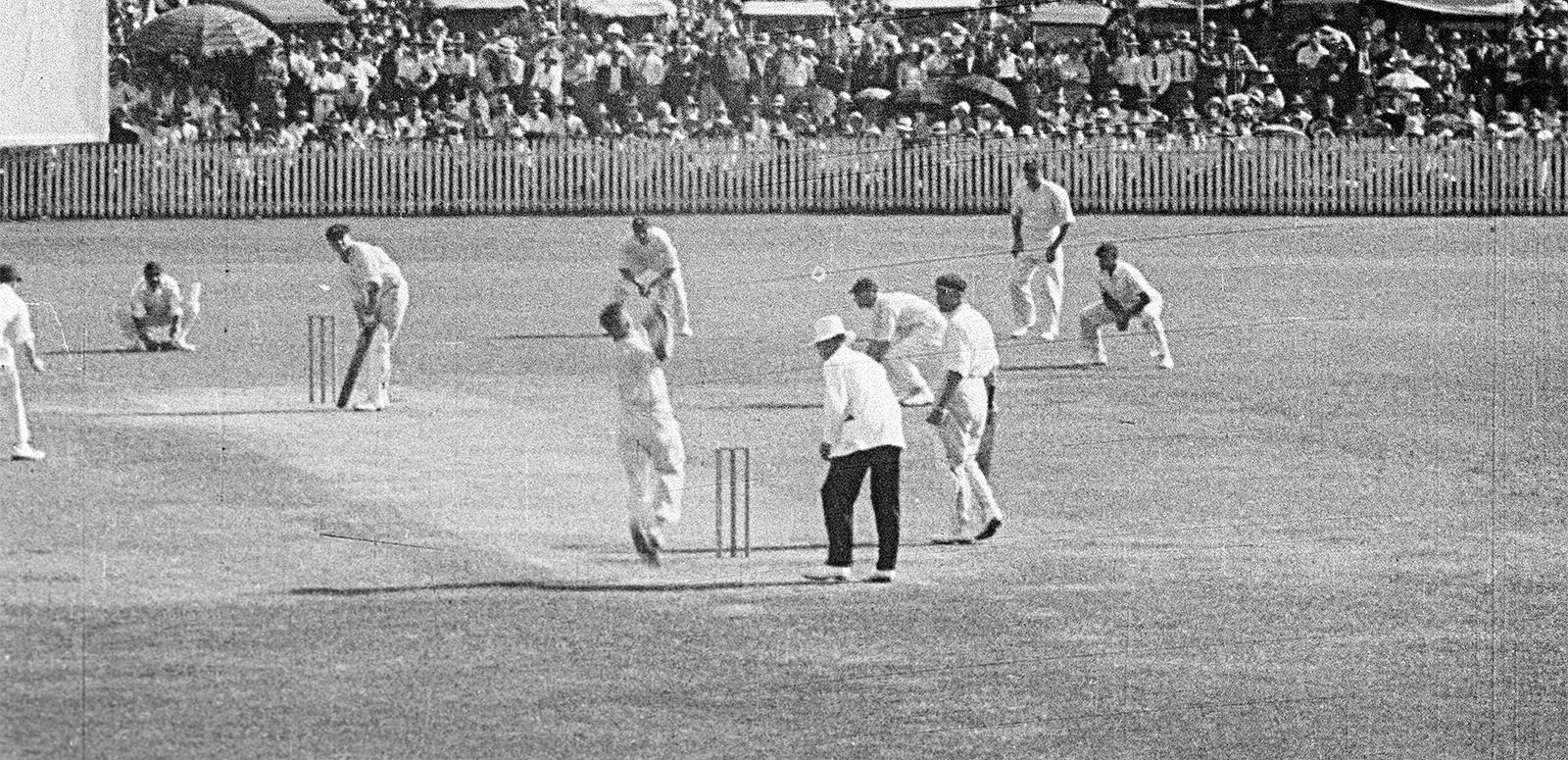 Cricket players and an umpire on the Sydney Cricket Ground playing cricket in 1933.