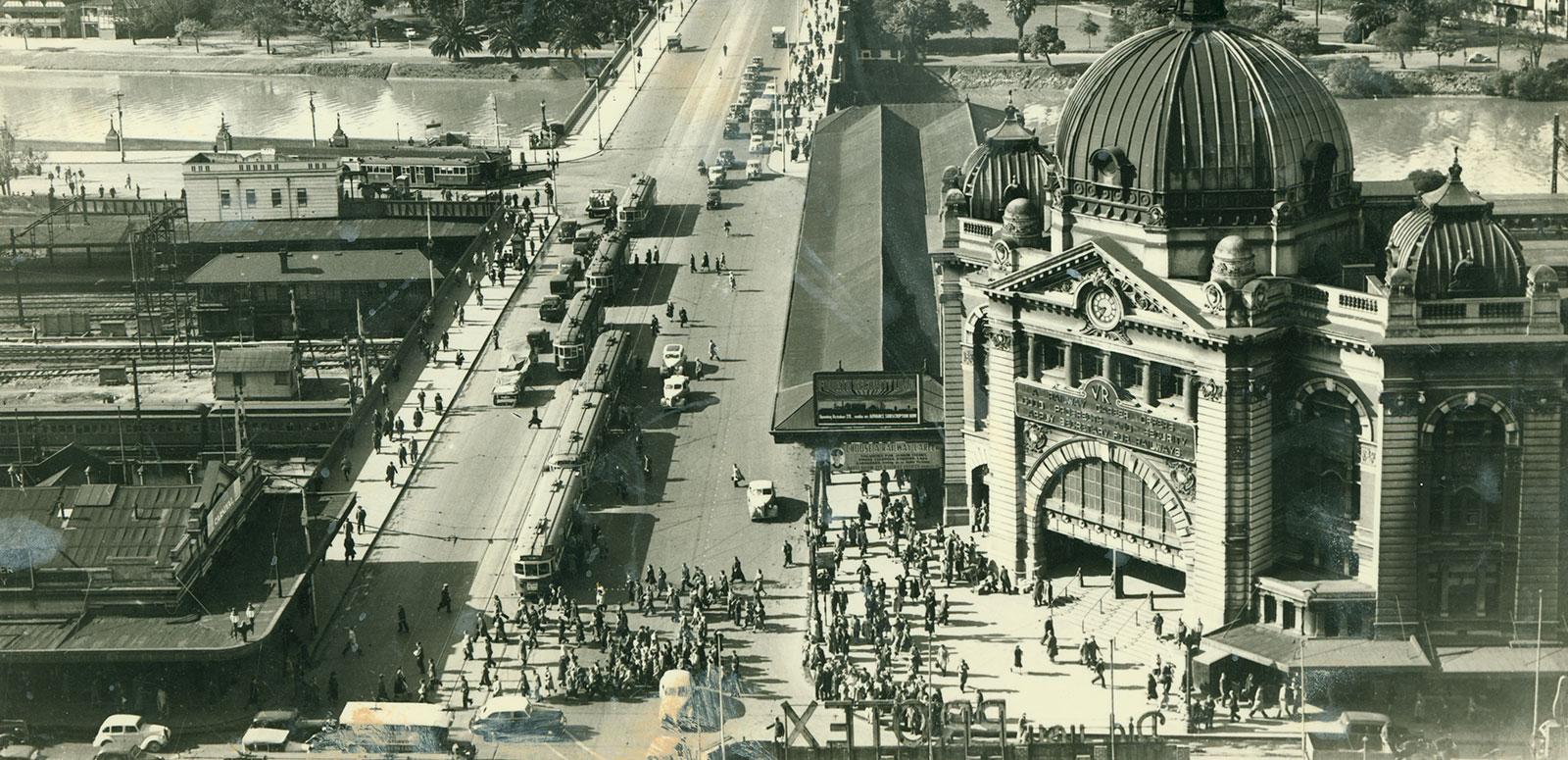 An overhead shot of Flinders St Station and Flinders Street in Melbourne in the early 20th Century