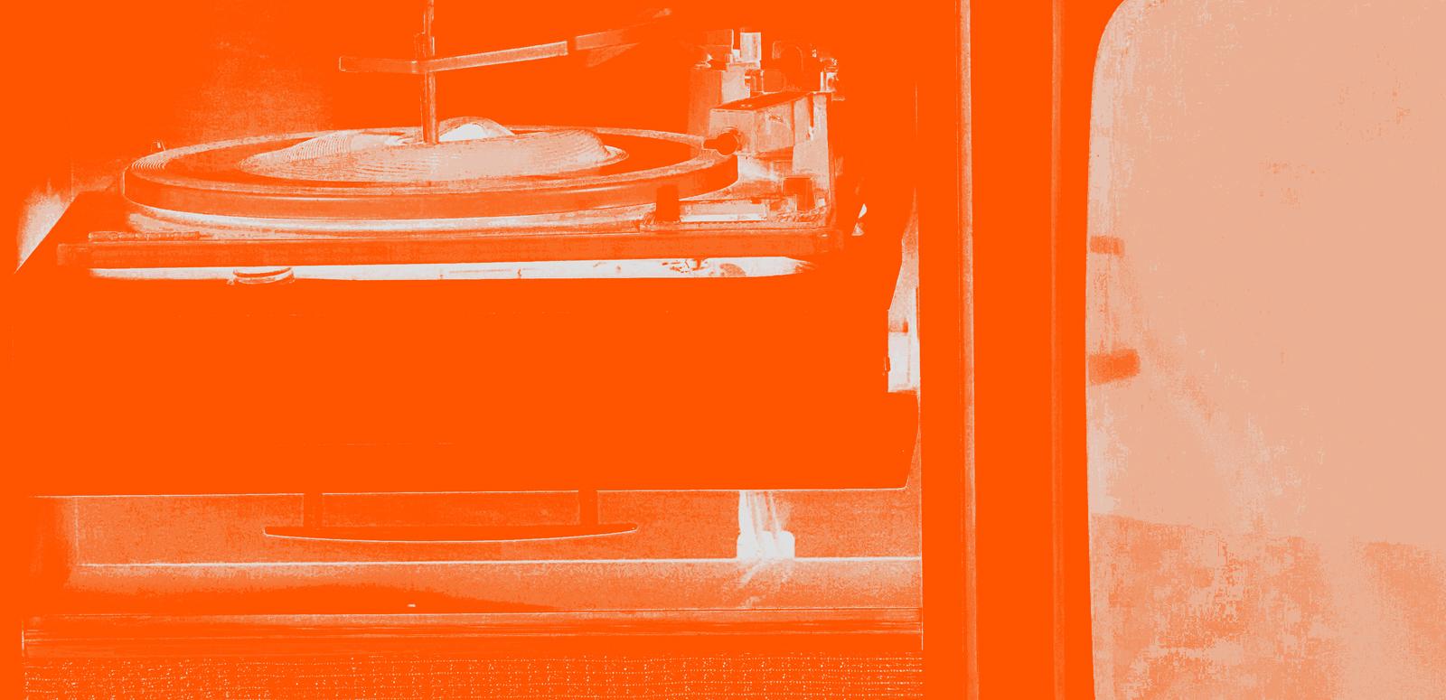 Close crop image of turntable with orange filter
