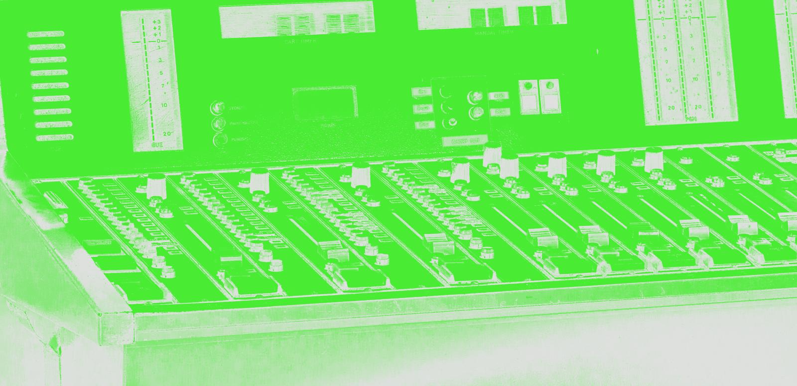 Close crop image of sound desk with green filter