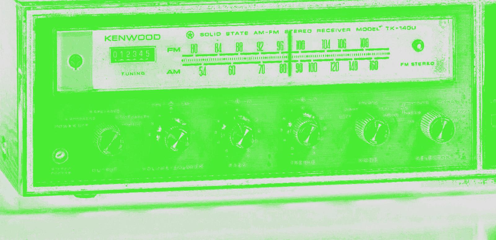 Close crop image of old radio with green filter