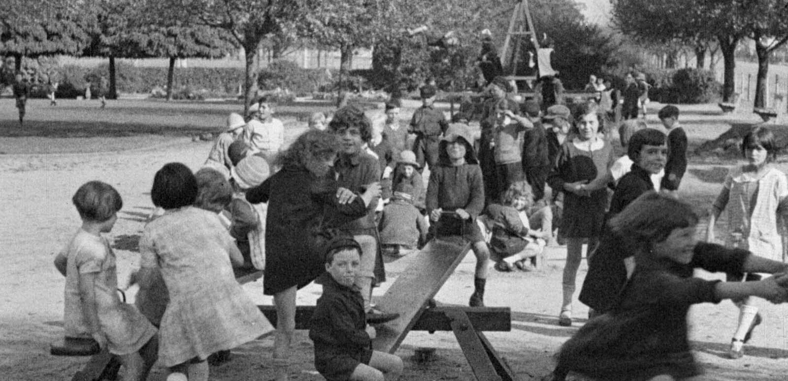 A group of schoolchildren playing in an Adelaide park in 1925