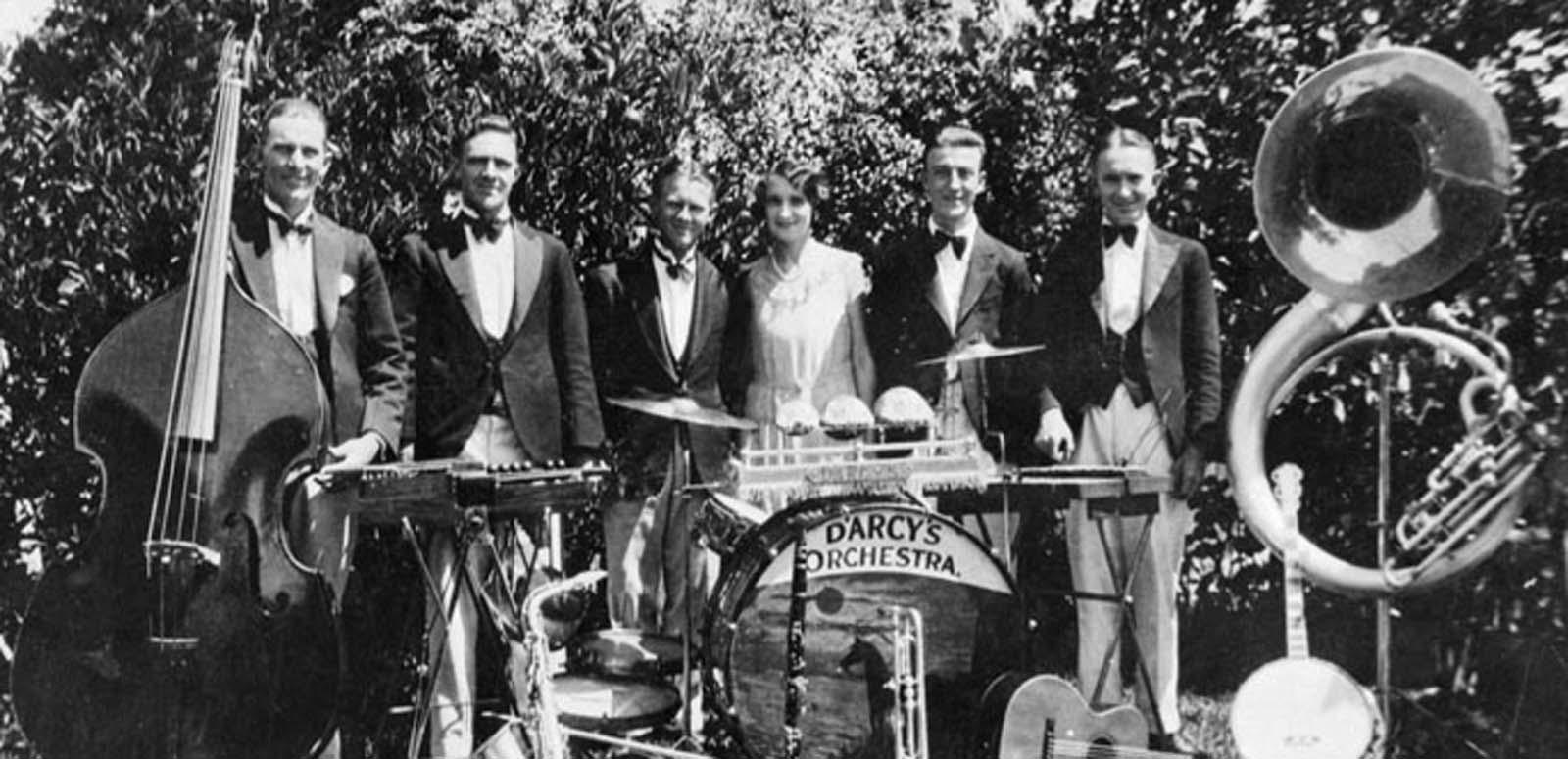 The six members of jazz dance band Doreen D’Arcy’s Orchestra pose with their instruments in 1931