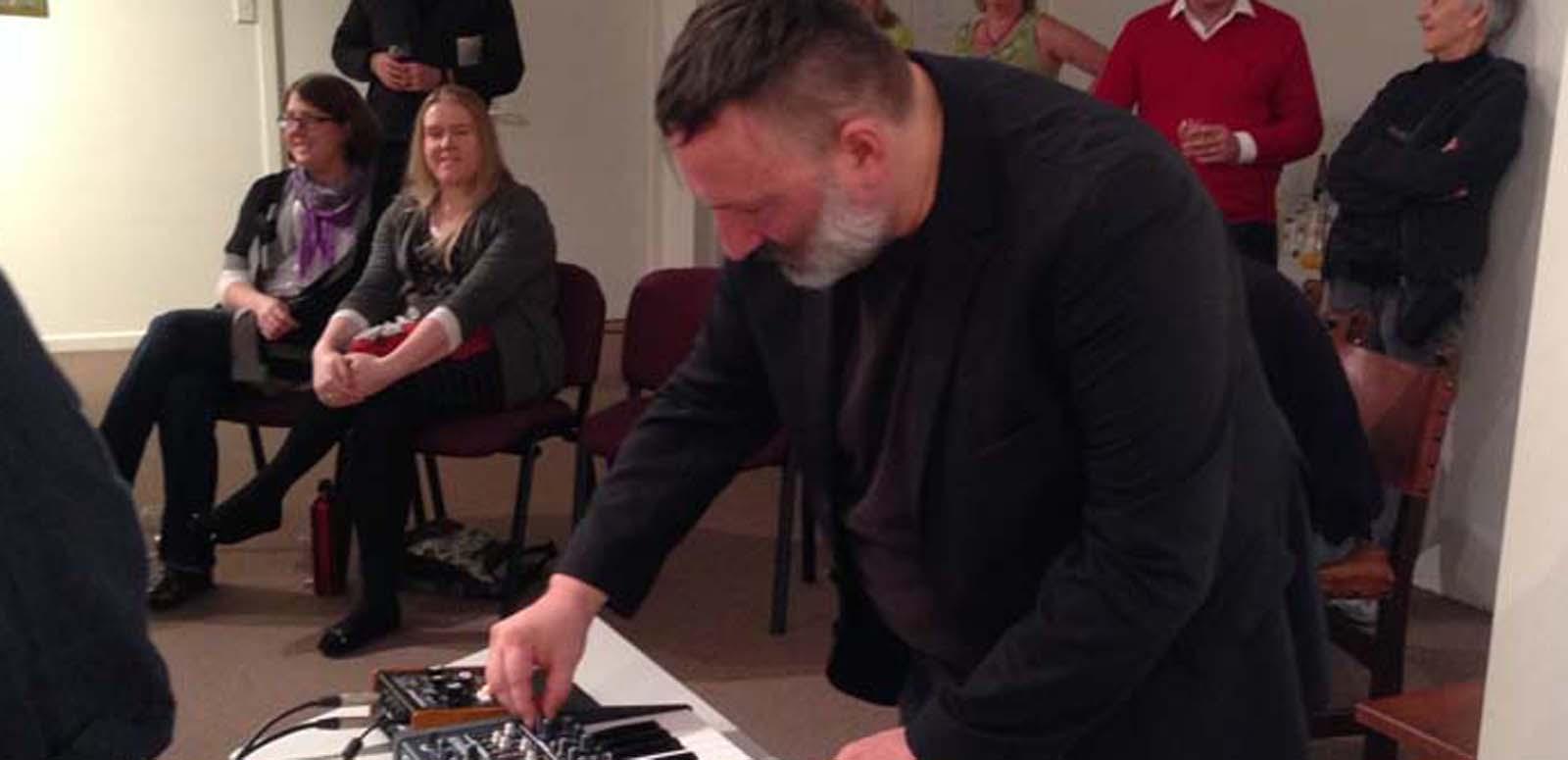 Composer Heinz Riegler plays a synthesiser at the Art of Sound exhibition in Burnie, Tasmania