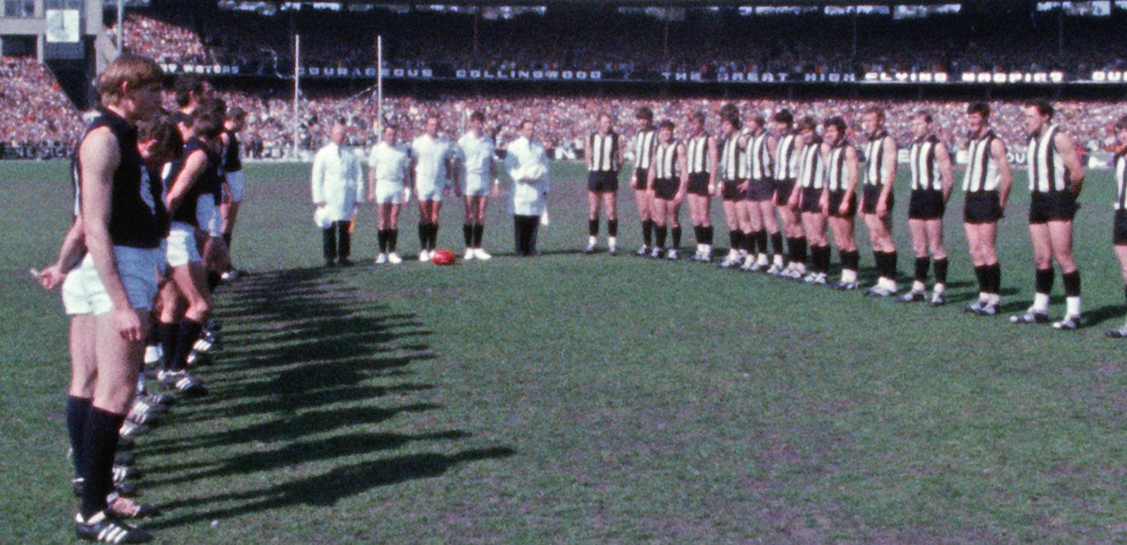 Carlton and Collingwood VFL teams line up on the MCG before the 1970 grand final match.