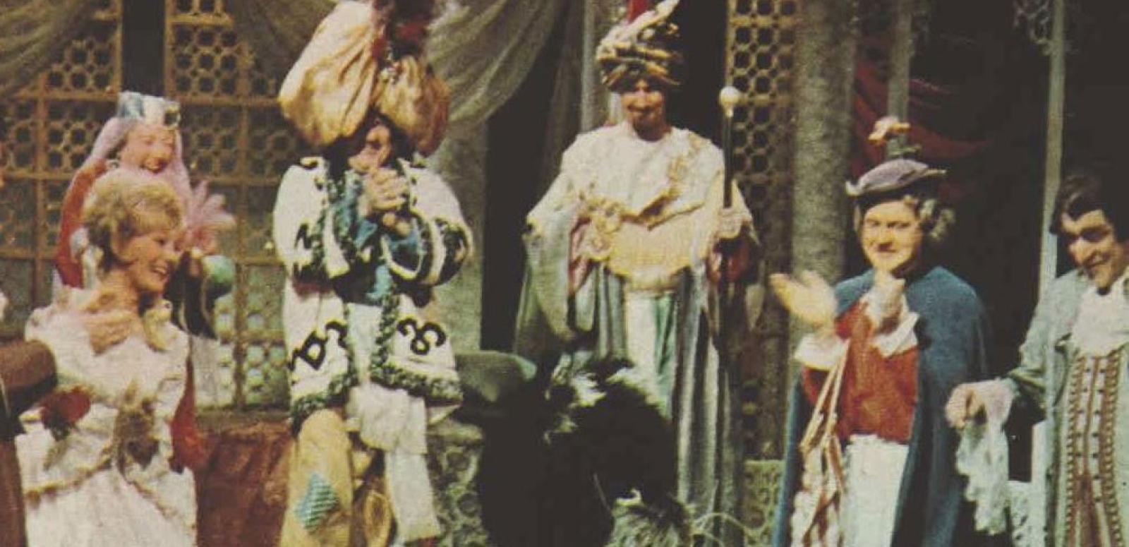 Costumed actors performing in the pantomime, Dick Whittington and His Cat