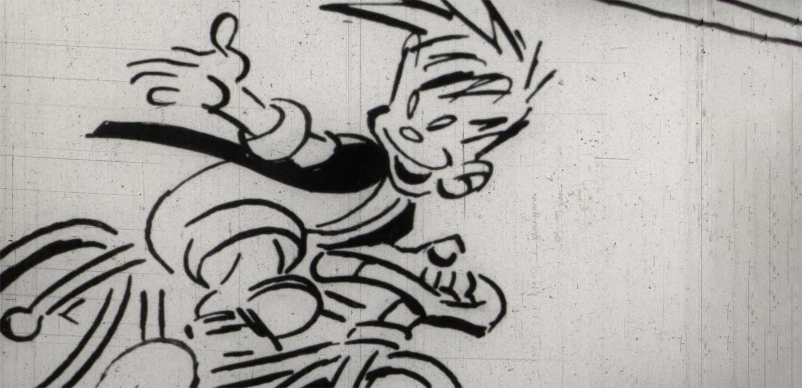 Cartoon character Ginger Meggs riding his bicycle, looking back over his shoulder with his thumb up