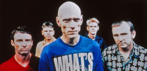 The five members of Australian rock band Midnight Oil. Lead singer Peter Garrett is at centre front of the photo. 