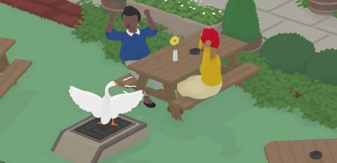 An screenshot from the animated Untitled Goose Game showing a goose on a chair honking at two startled women sitting at an outdoor table