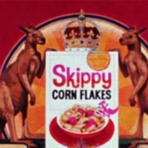 An advertising graphic of a coat of arms with a box of Skippy cornflakes at the centre, topped with a crown and flanked by two kangaroos