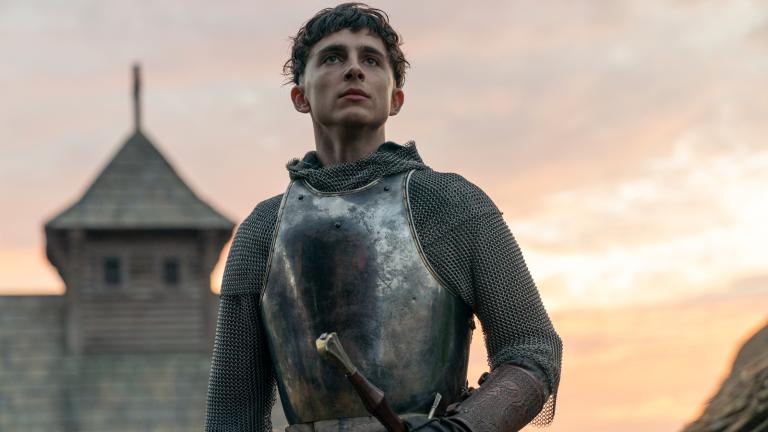 Timothée Chalamet wearing battle armour in a scene from the movie The King.