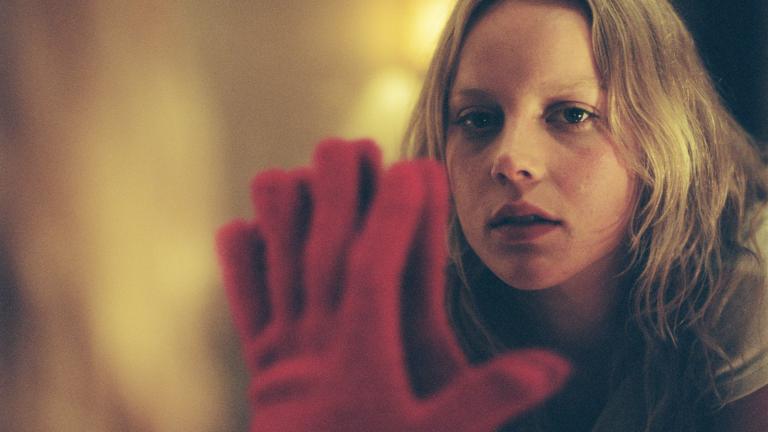 Abbie Cornish puts her hand up against a mirror in a scene from the film Somersault
