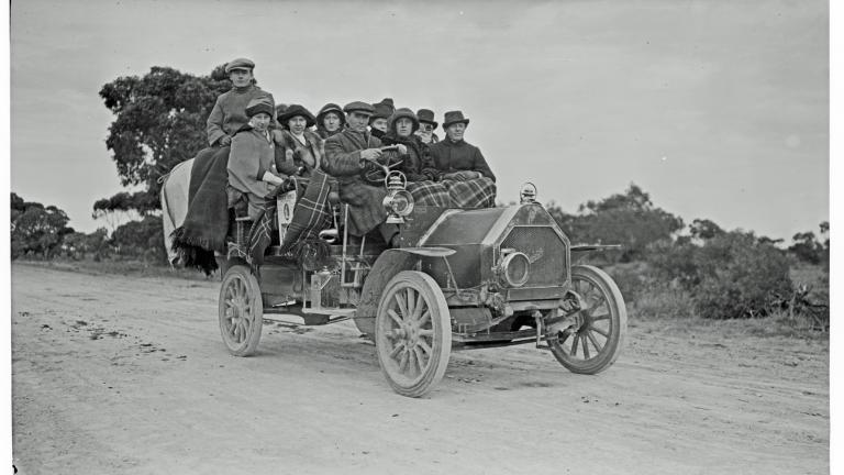 A family of 10 in a motor car, c1906