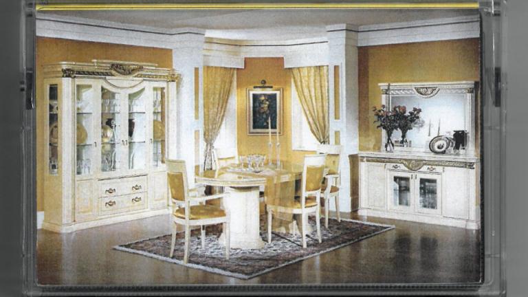 Cassette cover featuring the dining room of an expensive house.