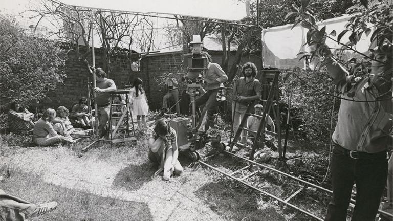 Caddie film crew setting up in a Sydney backyard.