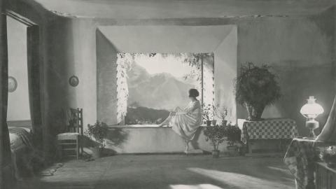 Leni Riefenstahl sits looking out the window in a still from the German film Der Heilige Berg, 1926.