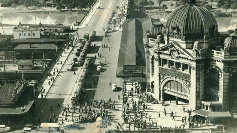 An overhead shot of Flinders St Station and Flinders Street in Melbourne in the early 20th Century