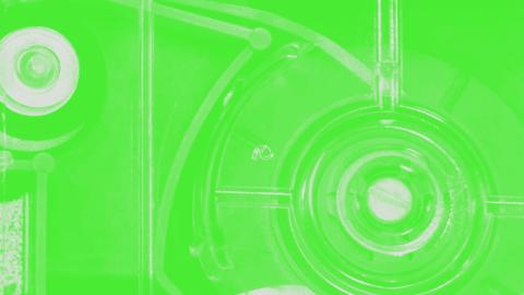 A stylised close-up of radio equipment tinted green