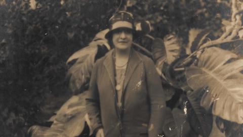 Sepia photograph of Dame Nellie Melba in a garden