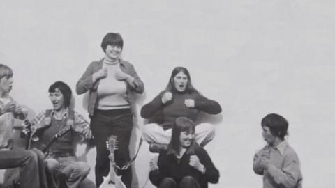 Six women posing for the cover of  The Ovarian Sisters' album. Black and white photo