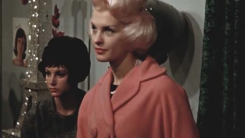 Two women at a 1950s hairdressing convention