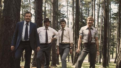 The detectives of the final 1974 season of the detective show Homicide pose in a forest: Charles Tingwell, Don Barker, Gary Day and Dennis Grosvenor