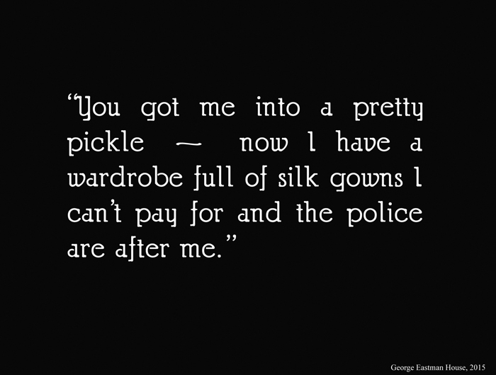 Intertitle from 'Drifting', 1923, white text on black screen and it reads "You got me into a pretty pickle - now I have a wardrobe full of silk gowns I can't pay for and the police are after me."